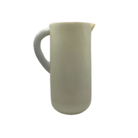 Florabelle Living White Marbled Resin Pitcher Hand-Poured