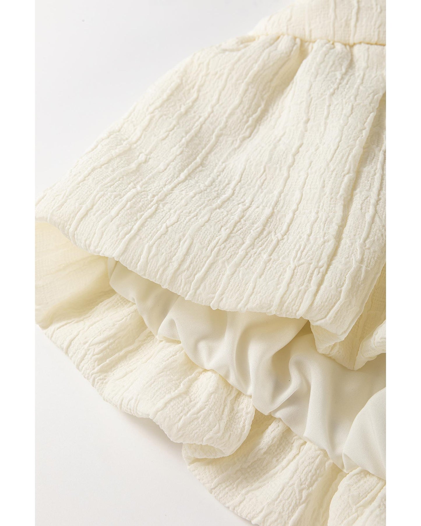 White Textured Bow Ties Front Bubble Hem Puff Short Sleeve Blouse - L