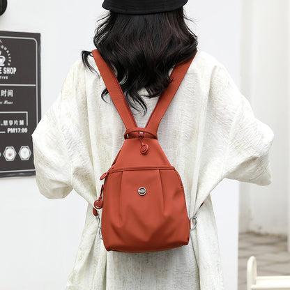 Orange Versatile Women's Convertible Mini Backpack & Sling Bag - Stylish Anti-Theft Oxford Cloth Daypack, Fits 9.7in iPad